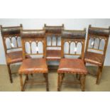 Five early 20th Century oak and leather dining chairs