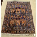 A small Persian prayer rug.