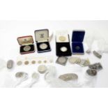 A selection of cased and loose British and other coinage,