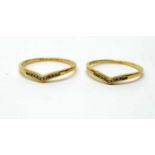 Two diamond set wishbone pattern rings,