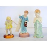 A selection of ceramic figures by Worcester, Doulton and Paragon.