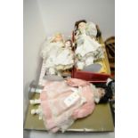 A selection of porcelain and other dolls