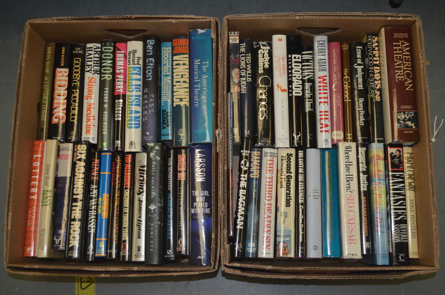 A collection of hardback novels and other books.