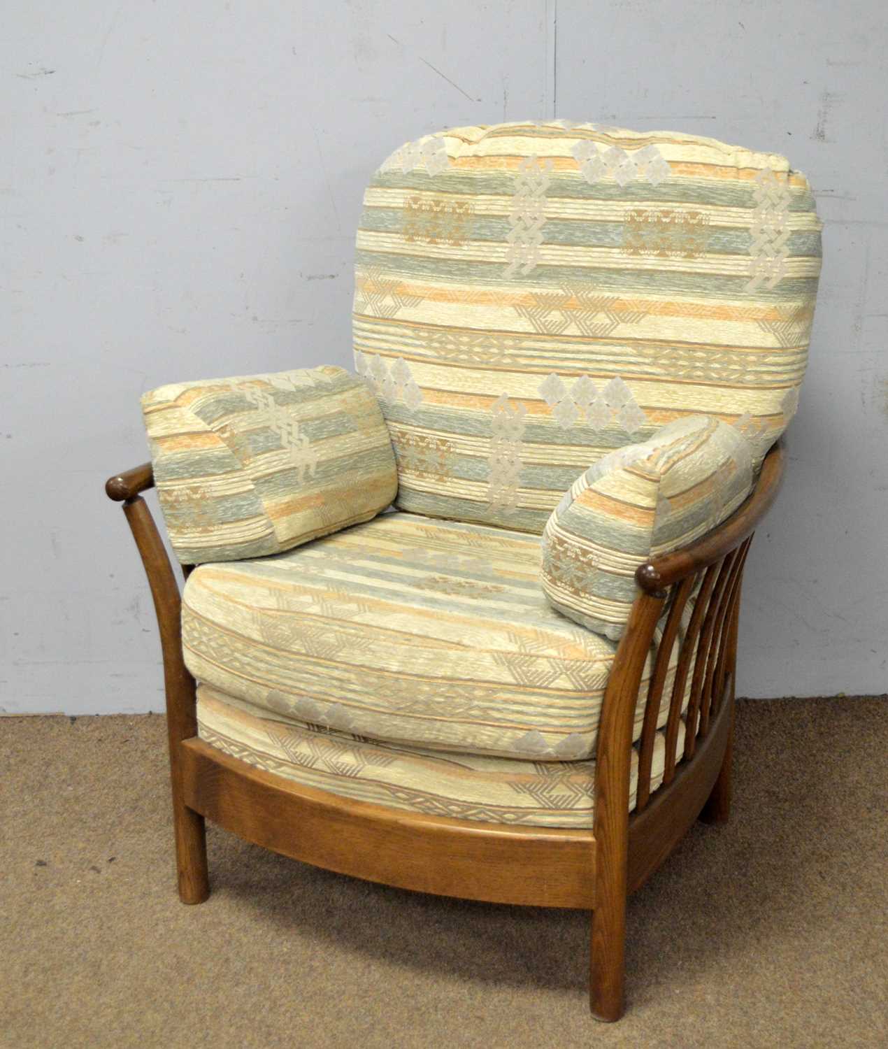 Ercol: an elm 'Renaissance' style Golden Dawn armchair