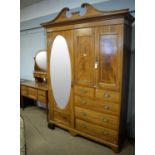An early 20th C mahogany and banded wardrobe; and matching dressing table.