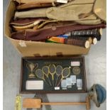 A selection of vintage tennis rackets and accessories.