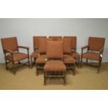 A set of eight 20th Century Carolean-style oak dining chairs.