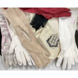A selection of ladies' evening gloves and a 1930s gentleman's silk scarf