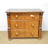 A 19th Century continental mahogany chest of three drawers