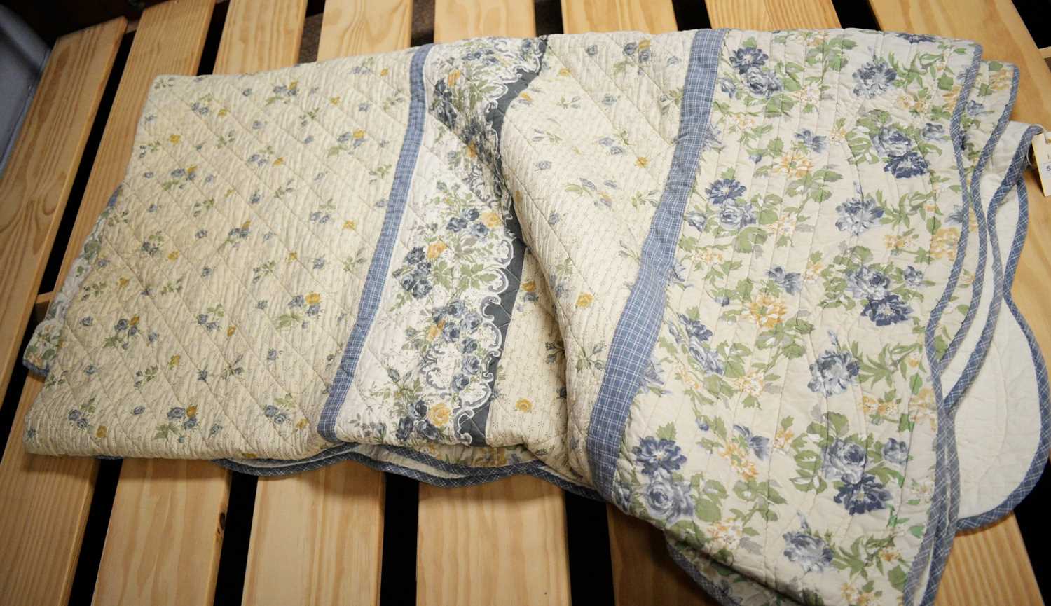 A quilted blanket and other textiles.