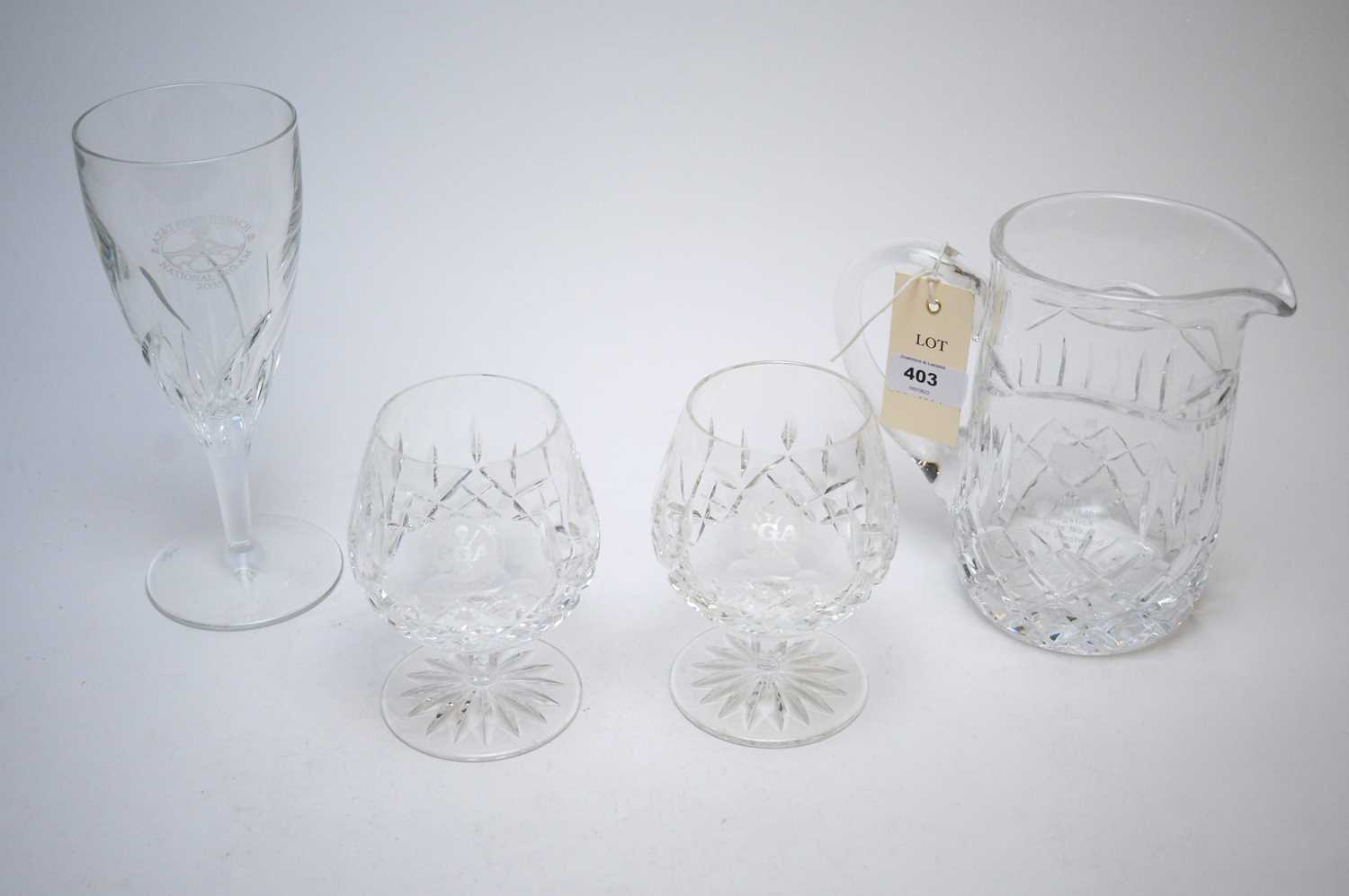 Various glass items etched with golf related inscriptions