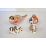 A collection of Royal Crown Derby ceramic paperweights