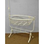 A Victorian white painted cast metal crib