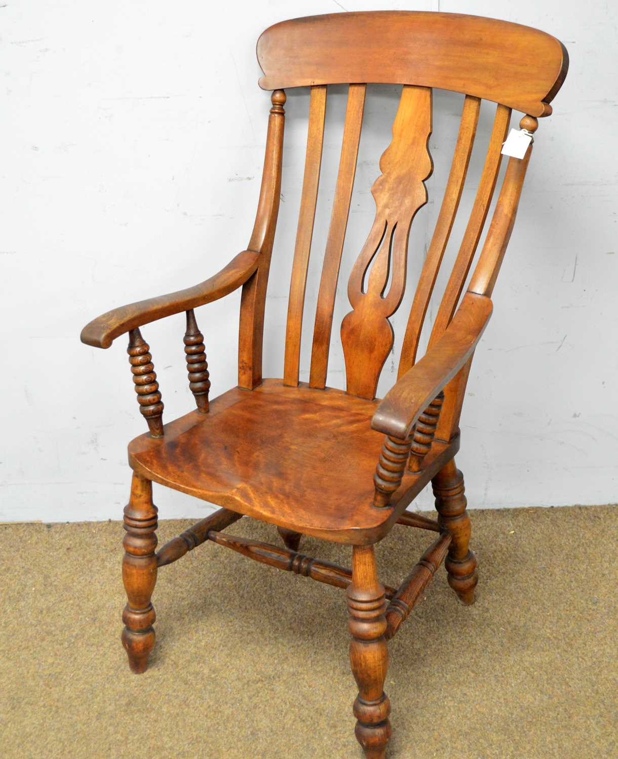 A late 19th Century rustic Windsor style armchair
