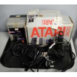 An Atari 2600 computer system; and other related items.