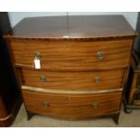 An early 20th Century mahogany bow front chest of drawers.