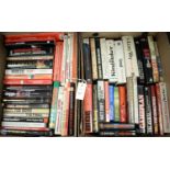 A selection of hardback and paperback books,