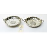 A pair of 800 standard Continental silver two handled bowls,