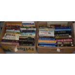A selection of hardback novels and other books.