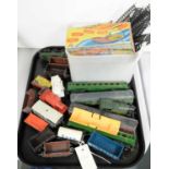 A selection of model railway trains, carriages and accessories, various makers.