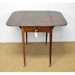 A Victorian mahogany Pembroke table.