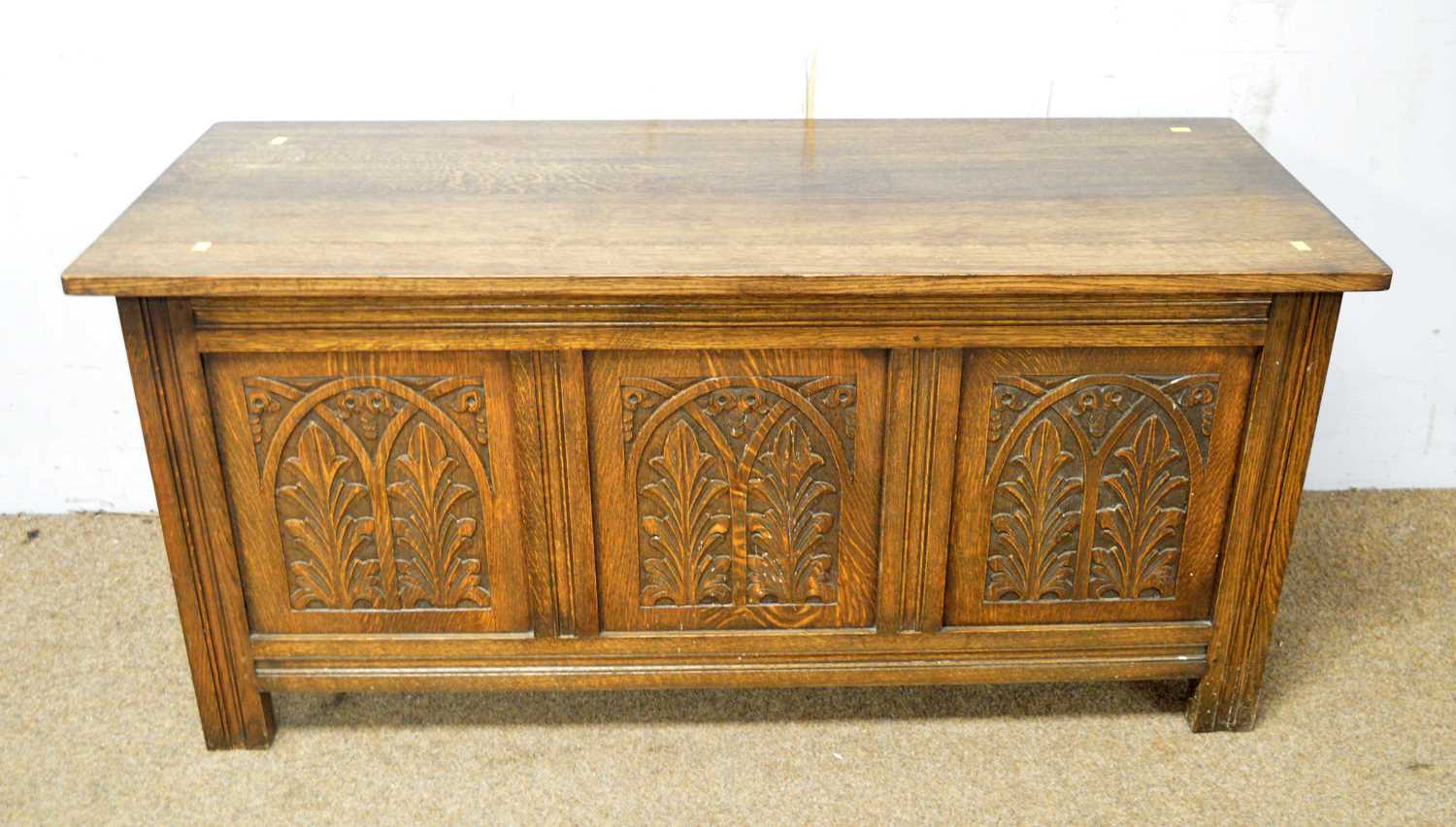 A carved oak blanket chest in the 17th Century style