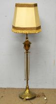 A classical style brass lamp standard