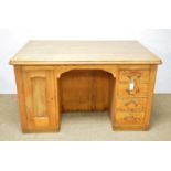 A Victorian stripped pine desk