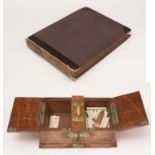 An early 20th Century scrap album and cigarette box relating to Palmers Shipbuilding & Iron Co Ltd,