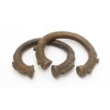 A pair of ceremobial bracelets, Yoruba, Nigeria, bronze, 8.5cms diameter. Provenance: The Balint