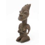 A female Ogboni Onile figure, in the classic style of Ijebu-Ode, Yoruba,