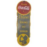 A Coca-Cola enamel advertising sign,