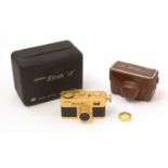 A Golden Ricoh 16 Subminiature camera.