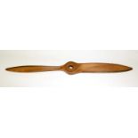 An early 20th Century twin-blade wooden propellor.