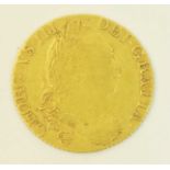A George III gold guinea.