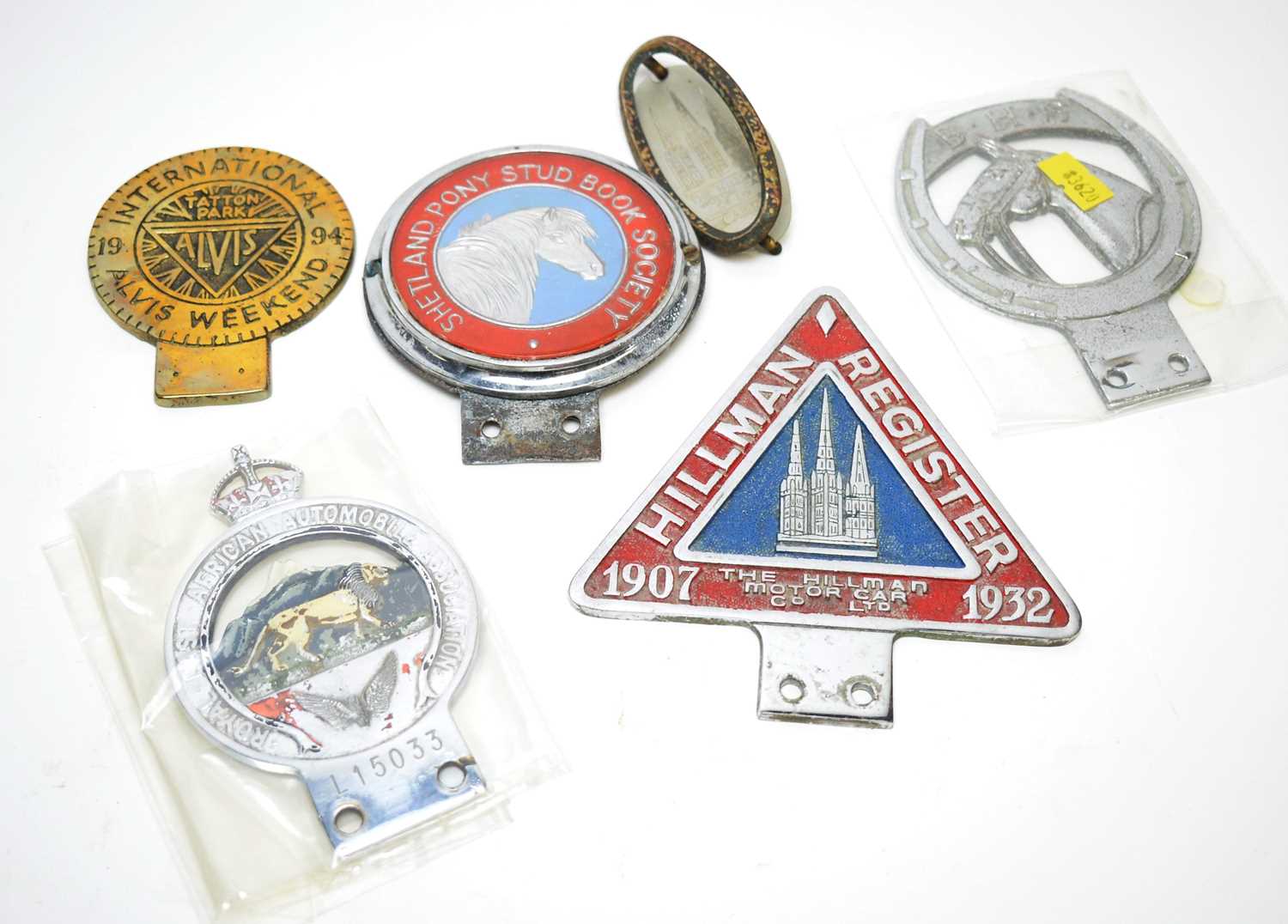 A selection of car badges.