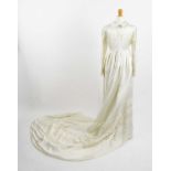 A 1960s Muriel Martin empire line wedding dress