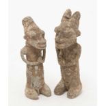 A pair of Onile figures