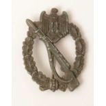 A WWII Waffen-SS Infantry assault badge,