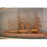 A 19th Century straw work model of a three-masted steamer.