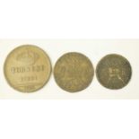 Two Irish gun money coins; and an Italian Tornesi coin.