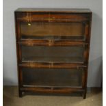 Criddle & Smith Ltd, Truro: an early 20th Century oak three section bookcase
