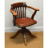 An early 20th Century stained beech swivel office armchair