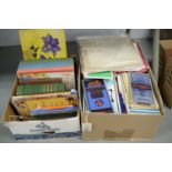 A collection of books, road and ordnance survey maps.