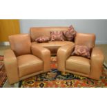 A modern brown leather three piece suite