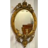 A 19th Century gilt gesso wall girandole mirror