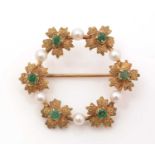 An emerald, pearl and yellow metal brooch,