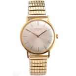 Longines: an 18ct yellow gold cased wristwatch,