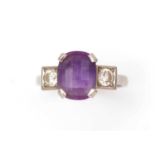 An amethyst and diamond ring,