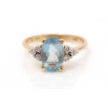 An aquamarine and diamond ring